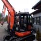 Kuvassa Lisävaloteline katolle Kubota KX057-4